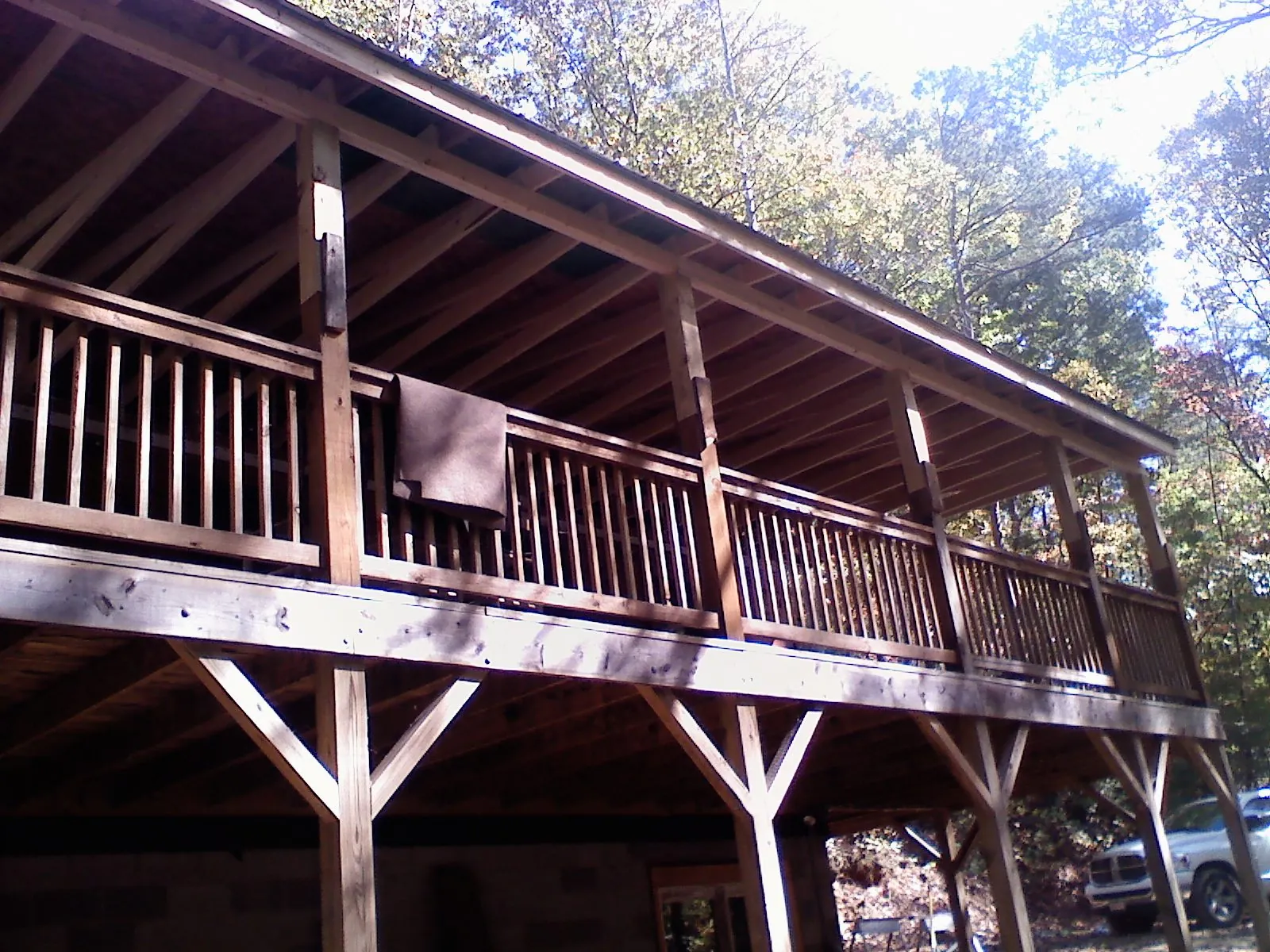 Timber framing under a new elevated porch and deck — Roof Leak Repair in Tingley by Roofing Brothers